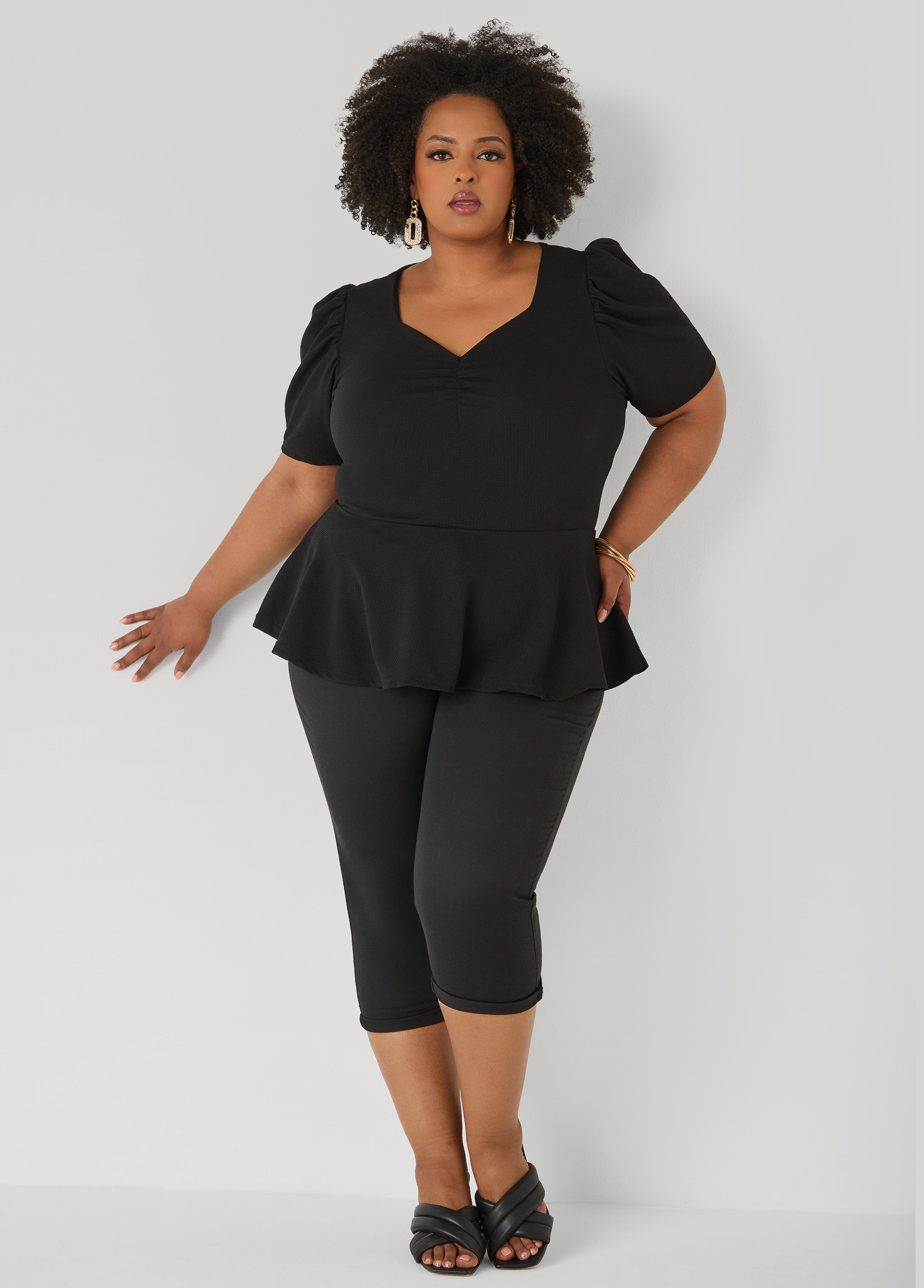 Puff Sleeved Textured Peplum Top