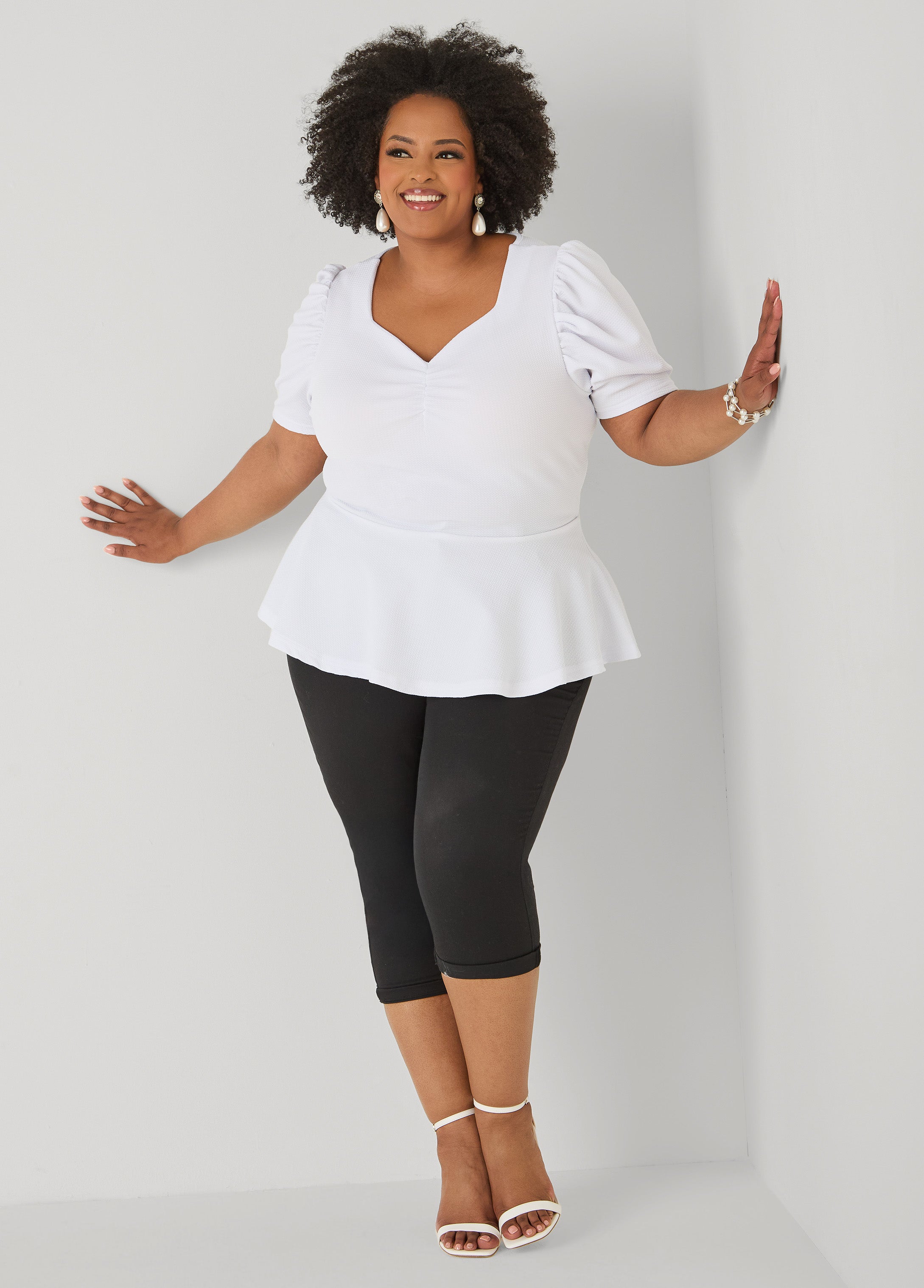 Puff Sleeved Textured Peplum Top
